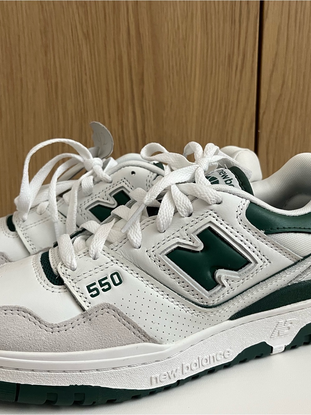 New Balance 550 White and Dark Green Low-Top Sneakers